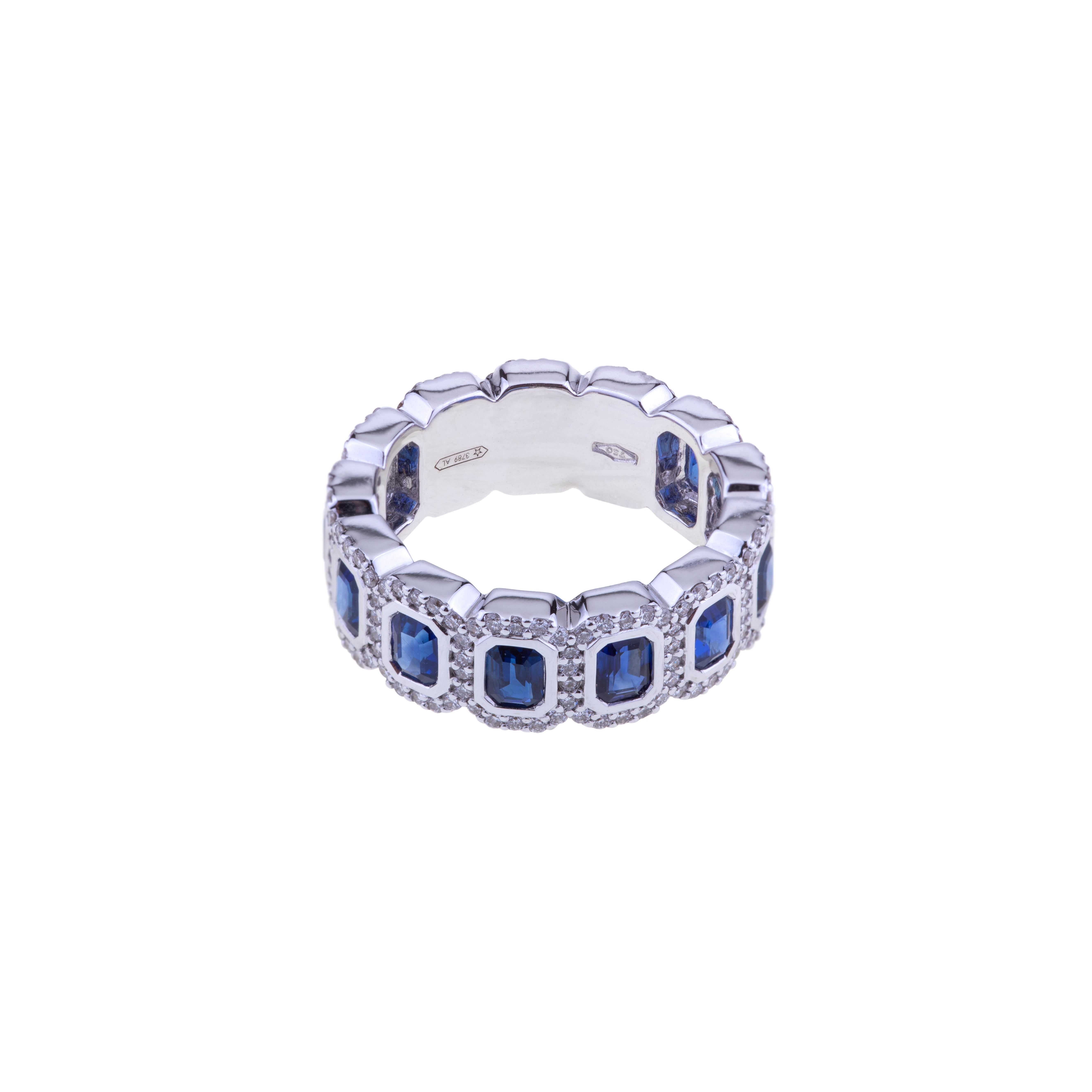 Selected intense octagonal blue sapphire ring band set in white gold with diamonds.
The ring is manufactured in white gold and set with n. 13 selected intense blue sapphires ct. 2.86 octagon cut and diamonds ct. 0.89 VVS. The weight of the 18kt gold