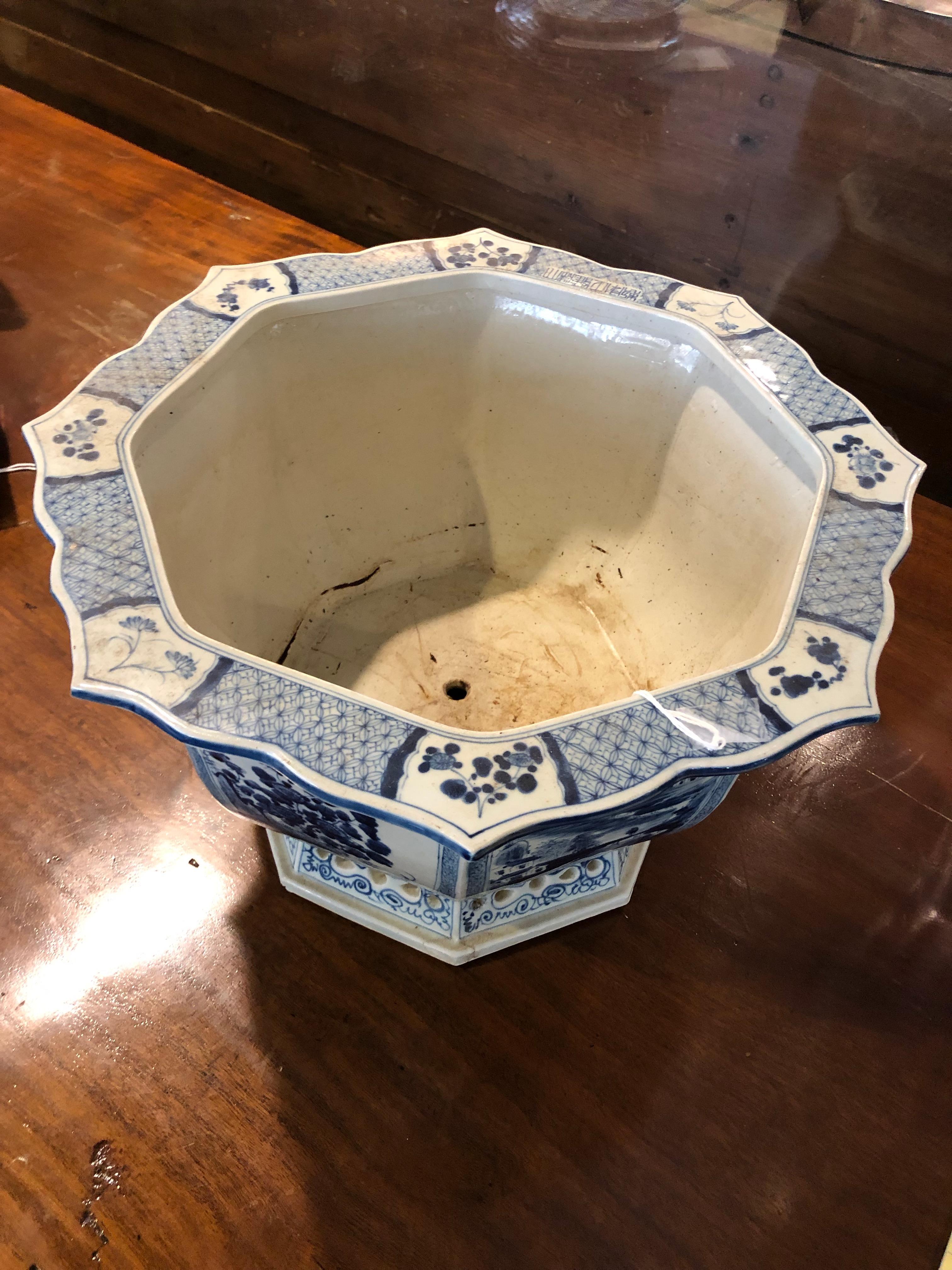 This octagon blue and white Chinese bowl is hand painted bottom, sides and top scalloped edge, sitting on like bottom unique in design for the time.