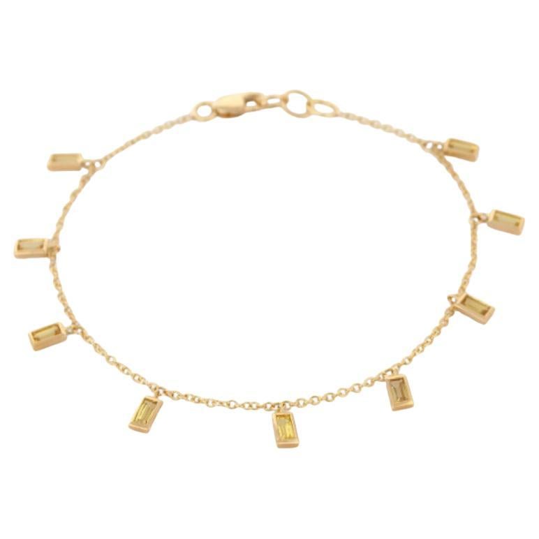 Gliederarmband aus 18 Karat Gelbgold mit gelbem Saphir im Smaragdschliff