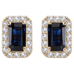 Pendientes con halo de diamantes y zafiro azul talla octágono en oro amarillo macizo de 14k