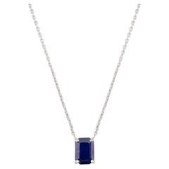 Colgante de zafiro azul talla octágono engarzado en oro blanco macizo de 14 quilates