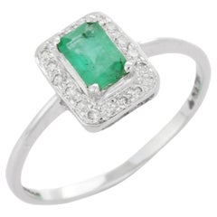 Octagon Cut Emerald Enclosed with Diamonds Engagement Ring in 18K White Gold