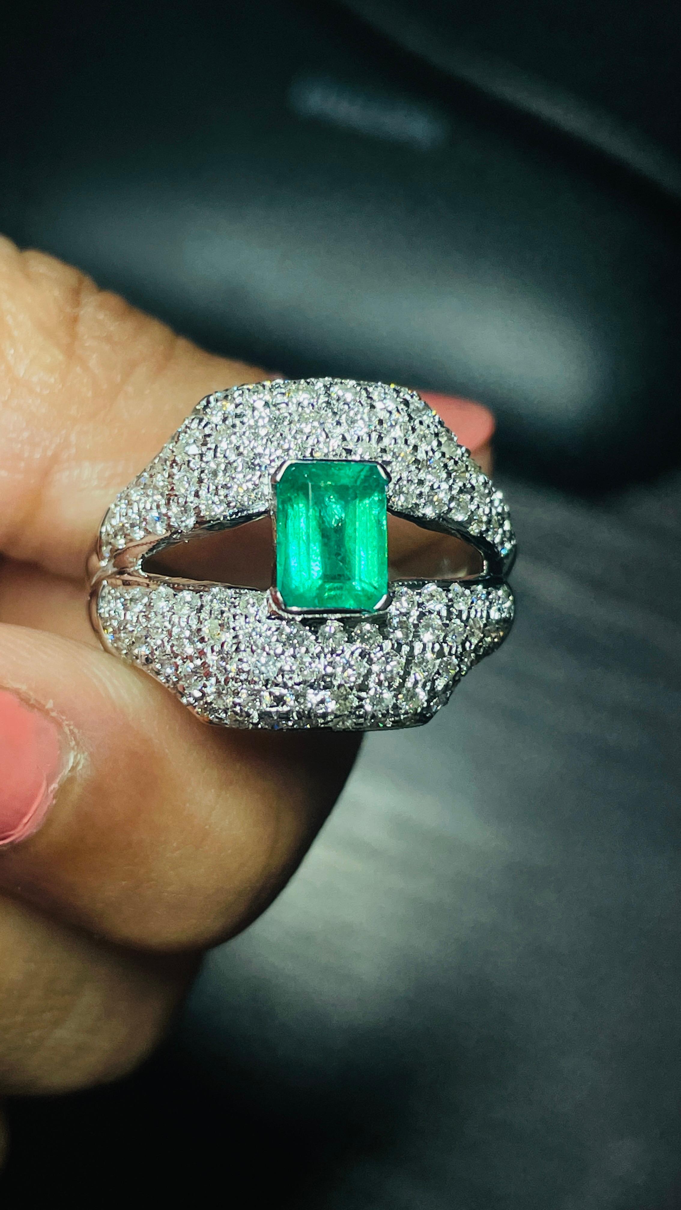 For Sale:  Regal Diamond and Emerald Split Shank Cocktail Ring in 18K White Gold 10