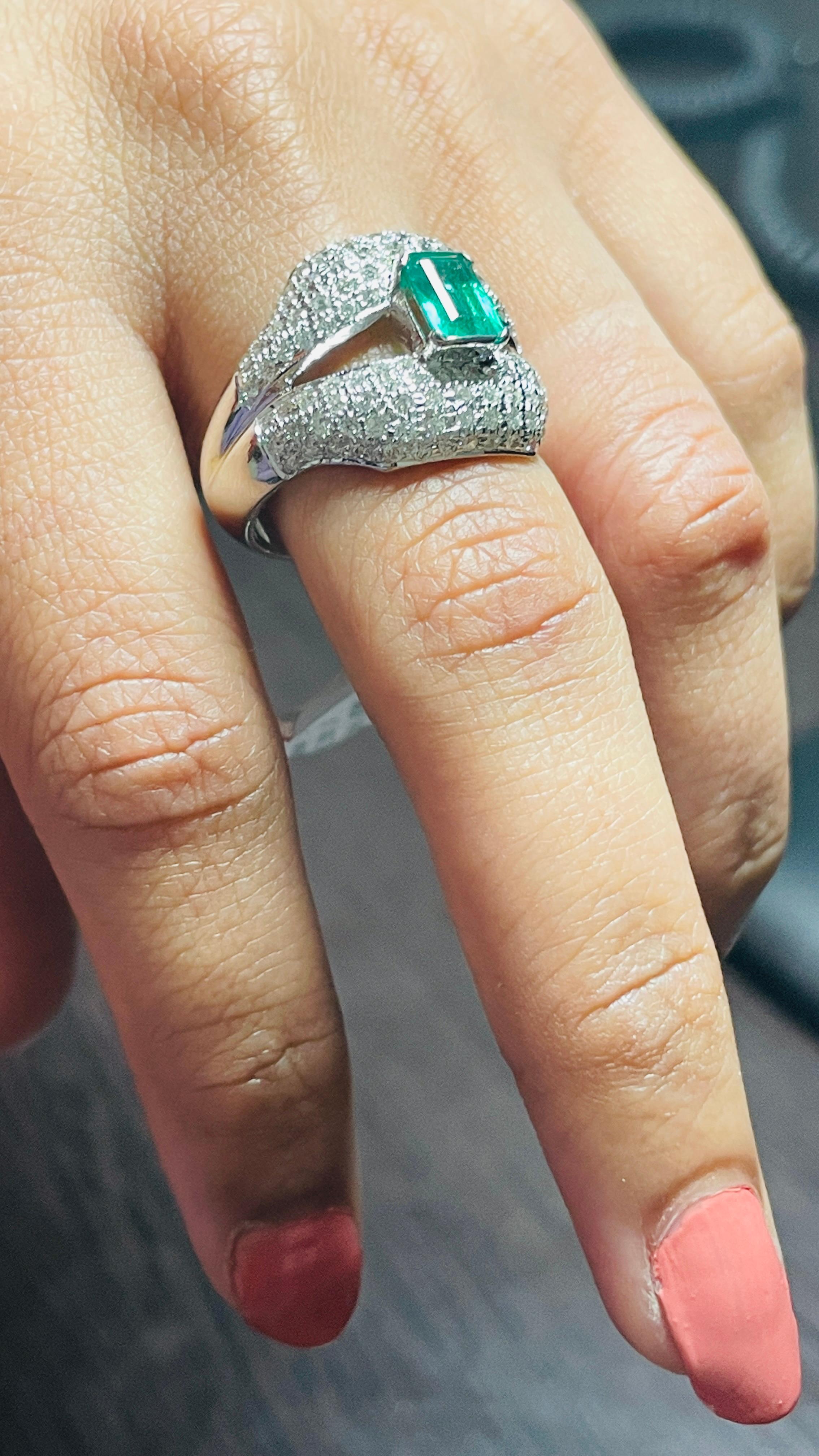 For Sale:  Regal Diamond and Emerald Split Shank Cocktail Ring in 18K White Gold 7