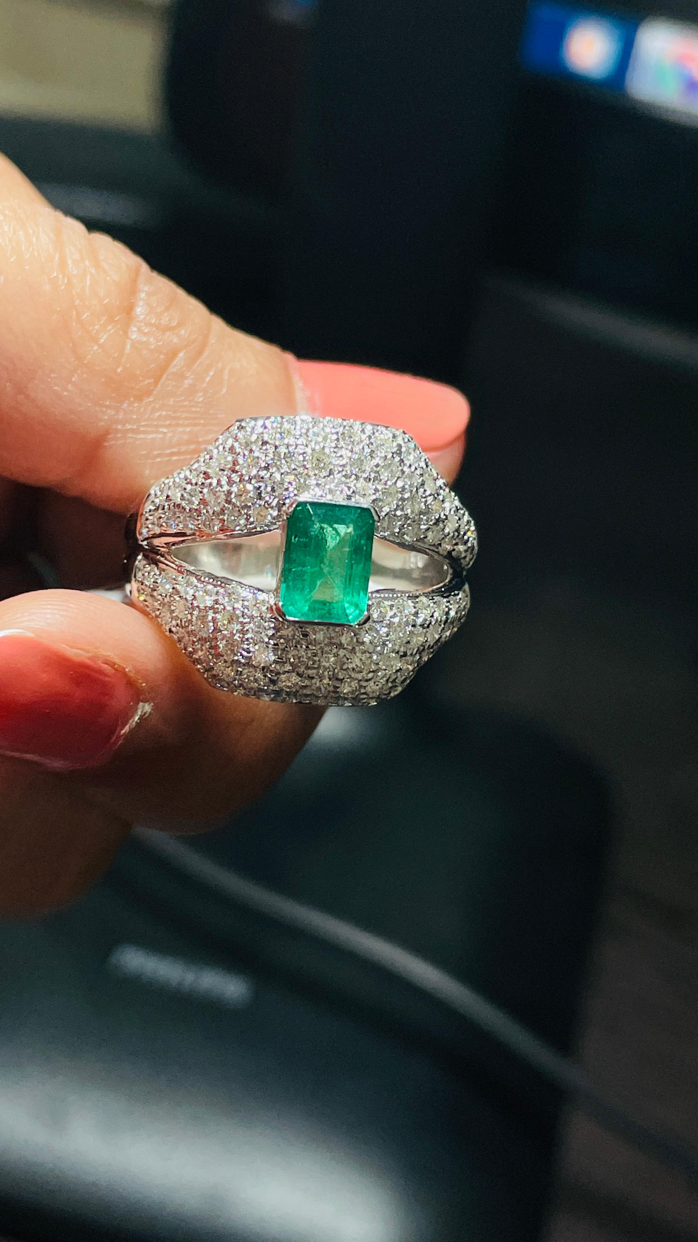 For Sale:  Regal Diamond and Emerald Split Shank Cocktail Ring in 18K White Gold 9