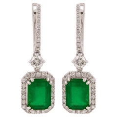 Orecchini da sposa con diamante aureolato e smeraldo dello Zambia con taglio ottagonale, oro bianco 14 carati
