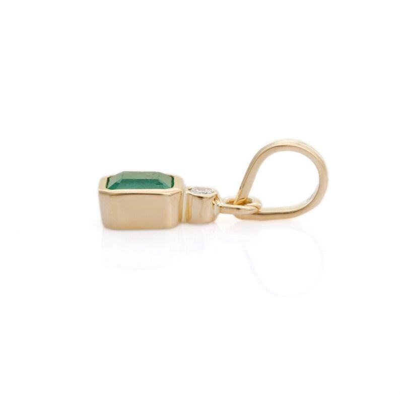 Dainty Natural Emerald Diamond Pendant in 18K Gold studded with octagon cut emerald and round cut diamond. This stunning piece of jewelry instantly elevates a casual look or dressy outfit. 
Emerald enhances intellectual capacity of the