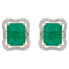 Boucles d
oreilles Halo en or jaune 14k avec diamant et émeraude octogonale