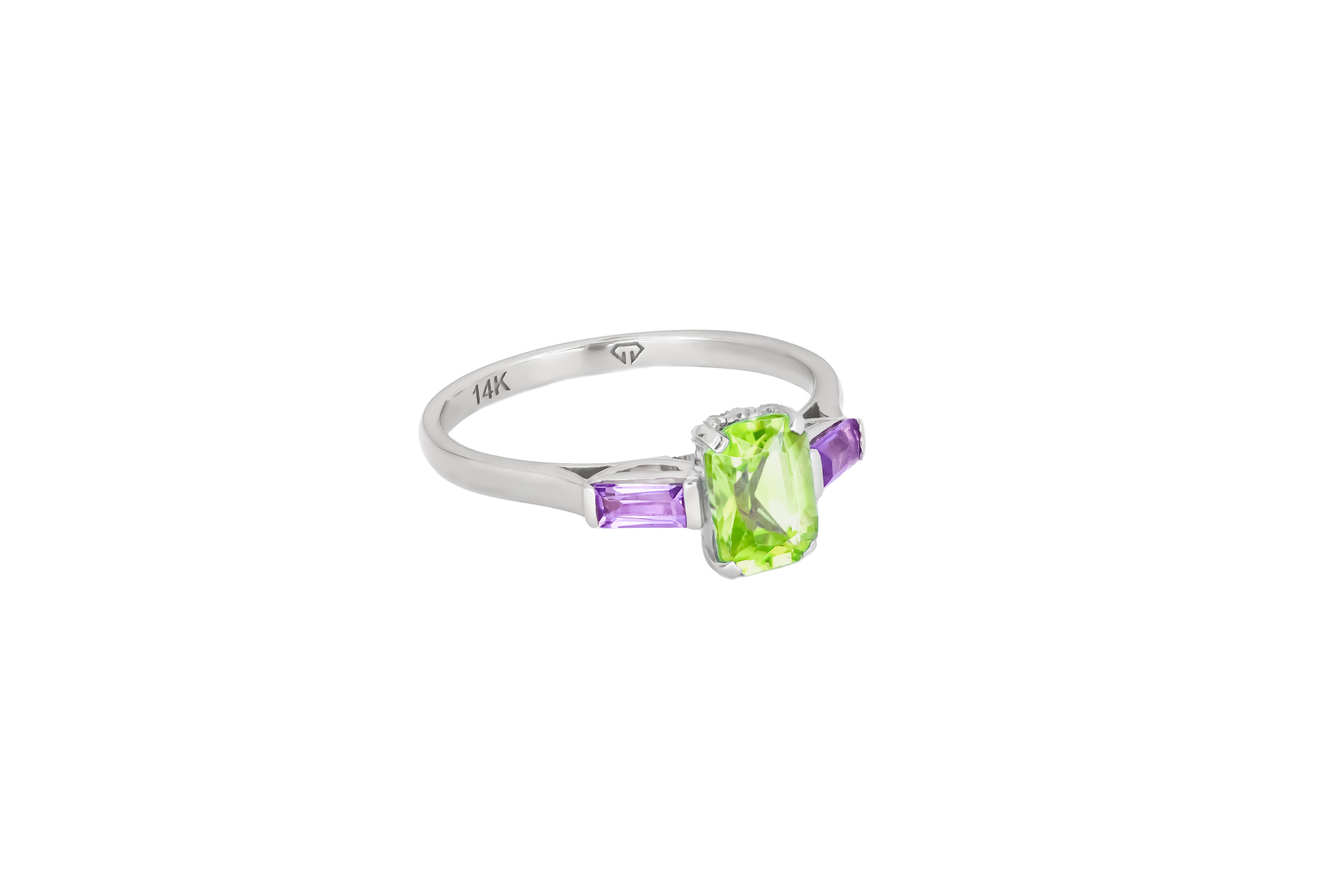 Octagon lab peridot 14k gold ring.  Trilogy Engagement Ring. Apple green lab peridot ring. Casual gold ring. 14k gold lab peridot and amethyst ring. Octagon lab peridot ring.  
 
Metal type: Gold
Metal stamp: 14k Gold
Weight: 2 gr depends from