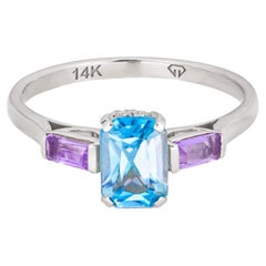 Octagon lab topaz 14k gold ring.