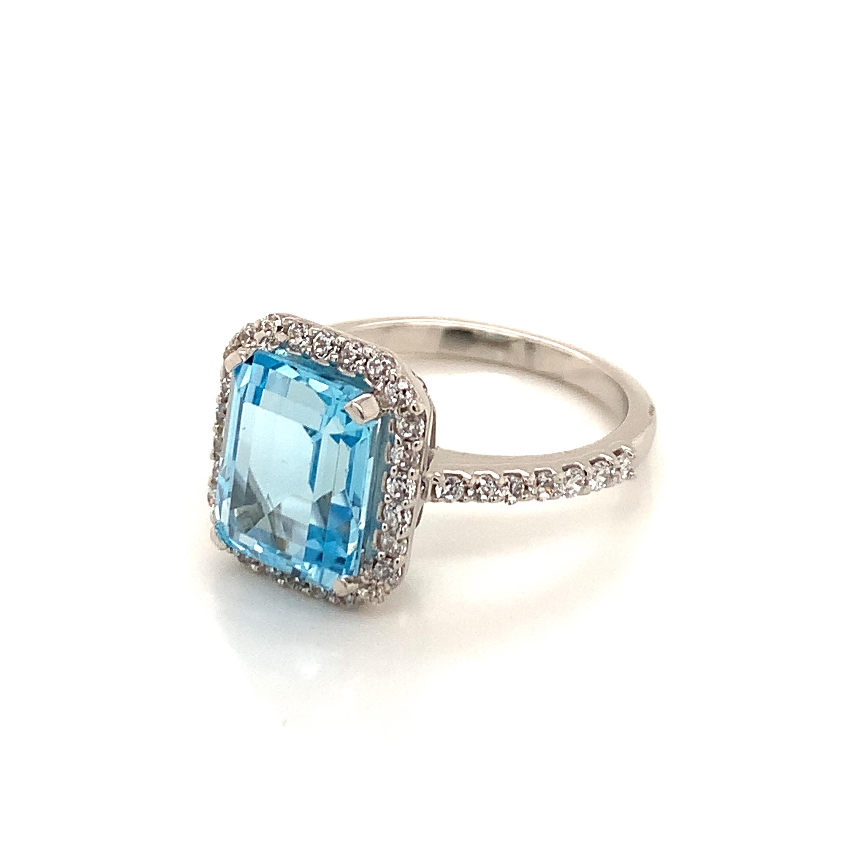 Octagon Shape Sky Blue Topaz Gemstone beautifully crafted with CZ in a Ring. A fiery Blue color December Birthstone. For a special occasion like Engagement or Proposal or may be as a gift for a special person.

Primary Stone Size - 10x8mm