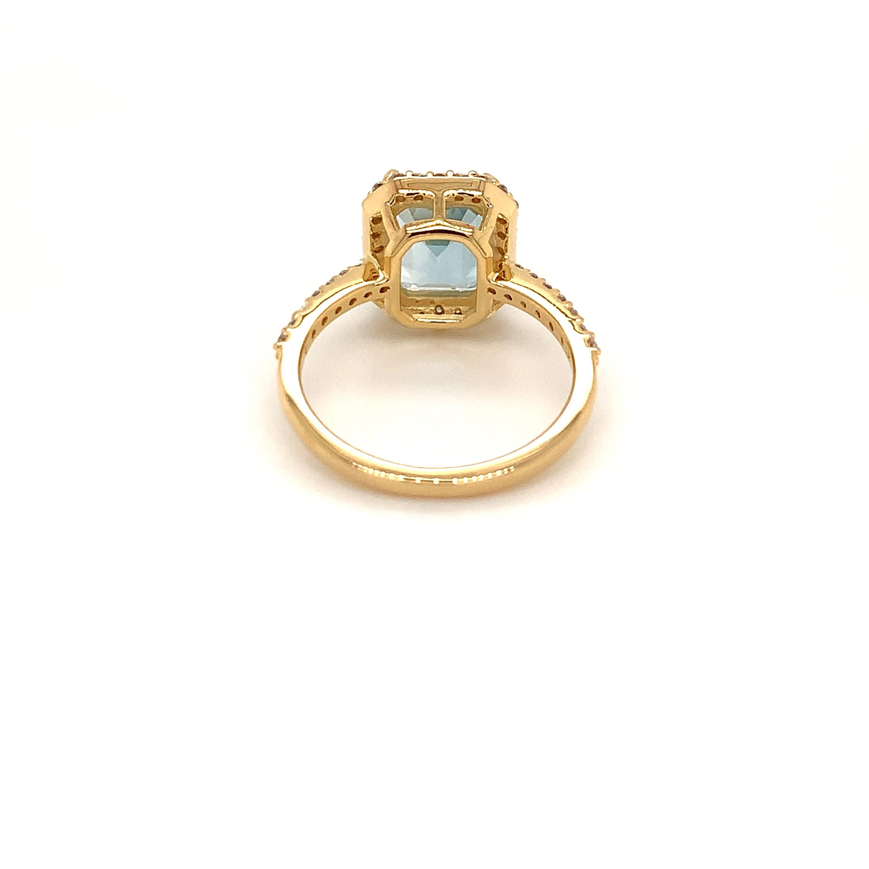 Octagon Natural Sky Blue Topaz And CZ Yellow Gold over Sterling Silver Ring In New Condition For Sale In Fort Lee, NJ