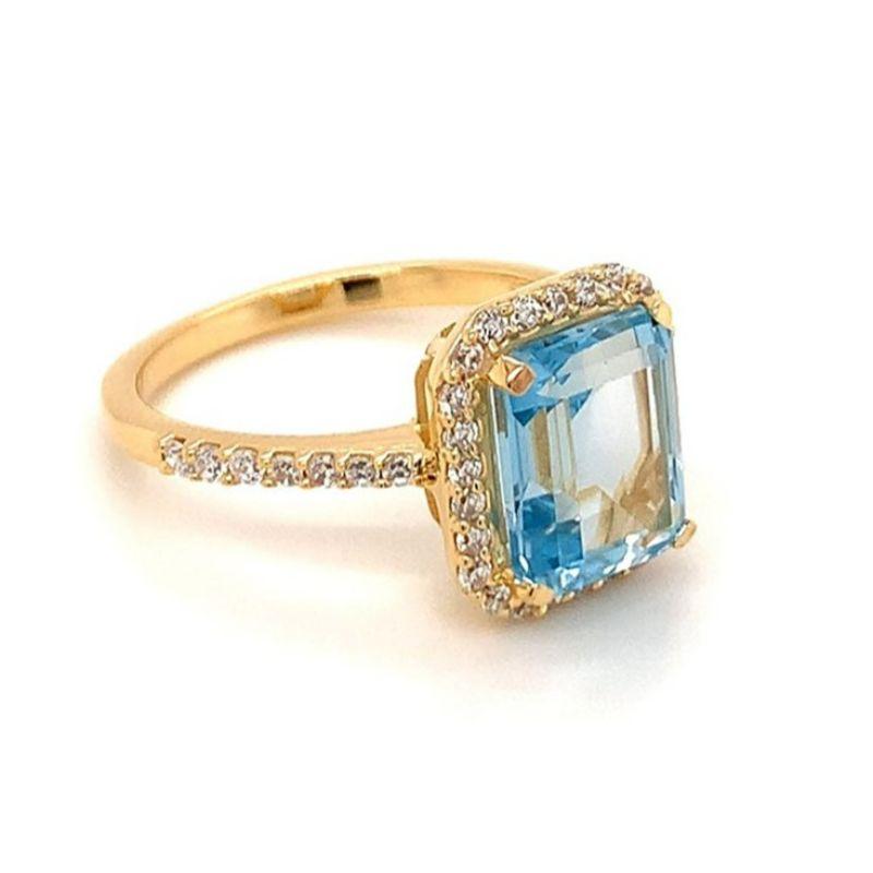 Octagon Cut Octagon Natural Sky Blue Topaz And CZ Yellow Gold over Sterling Silver Ring For Sale