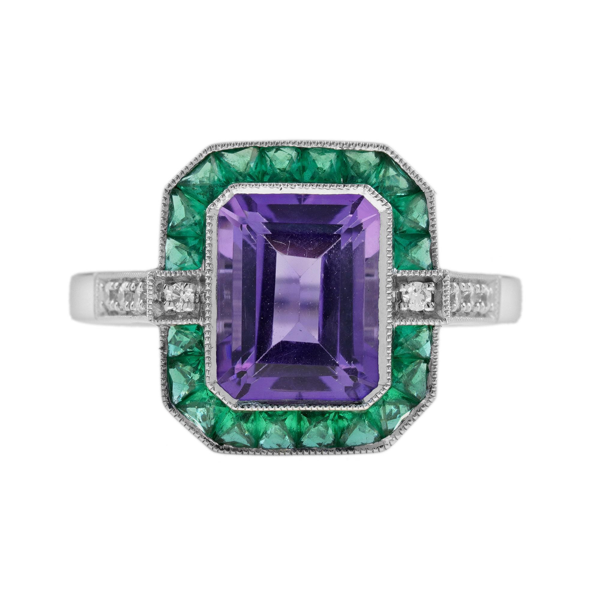 Centering an emerald cut amethyst, accented by French cut Emeralds, enhanced by diamonds. This Art Deco inspired ring is a perfect piece for an outstanding engagement ring, or to add colors to your day. 14K White Gold. 
Ring Information
Style: