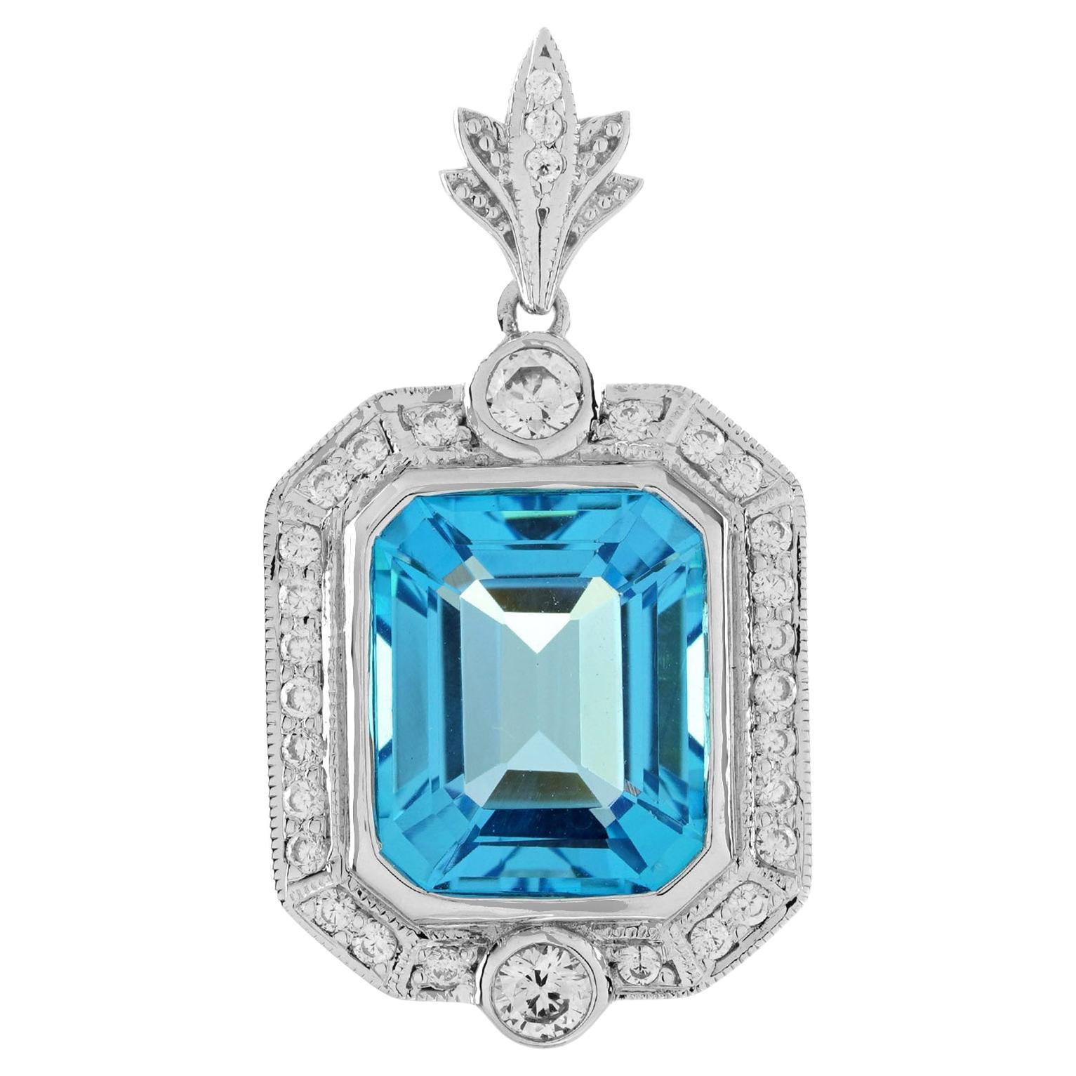 Pendentif en or blanc de forme octogonale avec topaze bleue suisse et halo de diamants de style Art déco en vente