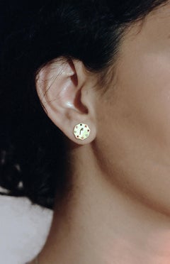 Boucles d'oreilles réglables en or blanc de forme octogonale.