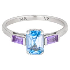 Octagon topaz 14k gold ring.