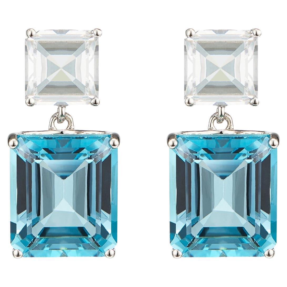 Achteckige Tropfenohrringe aus Weißgold mit weißem Topas und blauem Topas