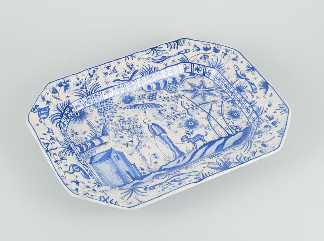 Vernissé Plat octogonal en céramique. Motif peint à la main d'un homme marchant avec son chien. Milieu du 20e siècle. en vente