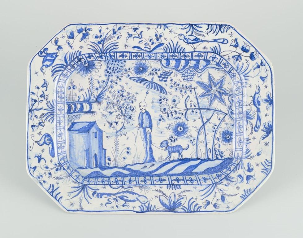 Plat octogonal en céramique. Motif peint à la main d'un homme marchant avec son chien. Milieu du 20e siècle. Excellent état - En vente à Copenhagen, DK