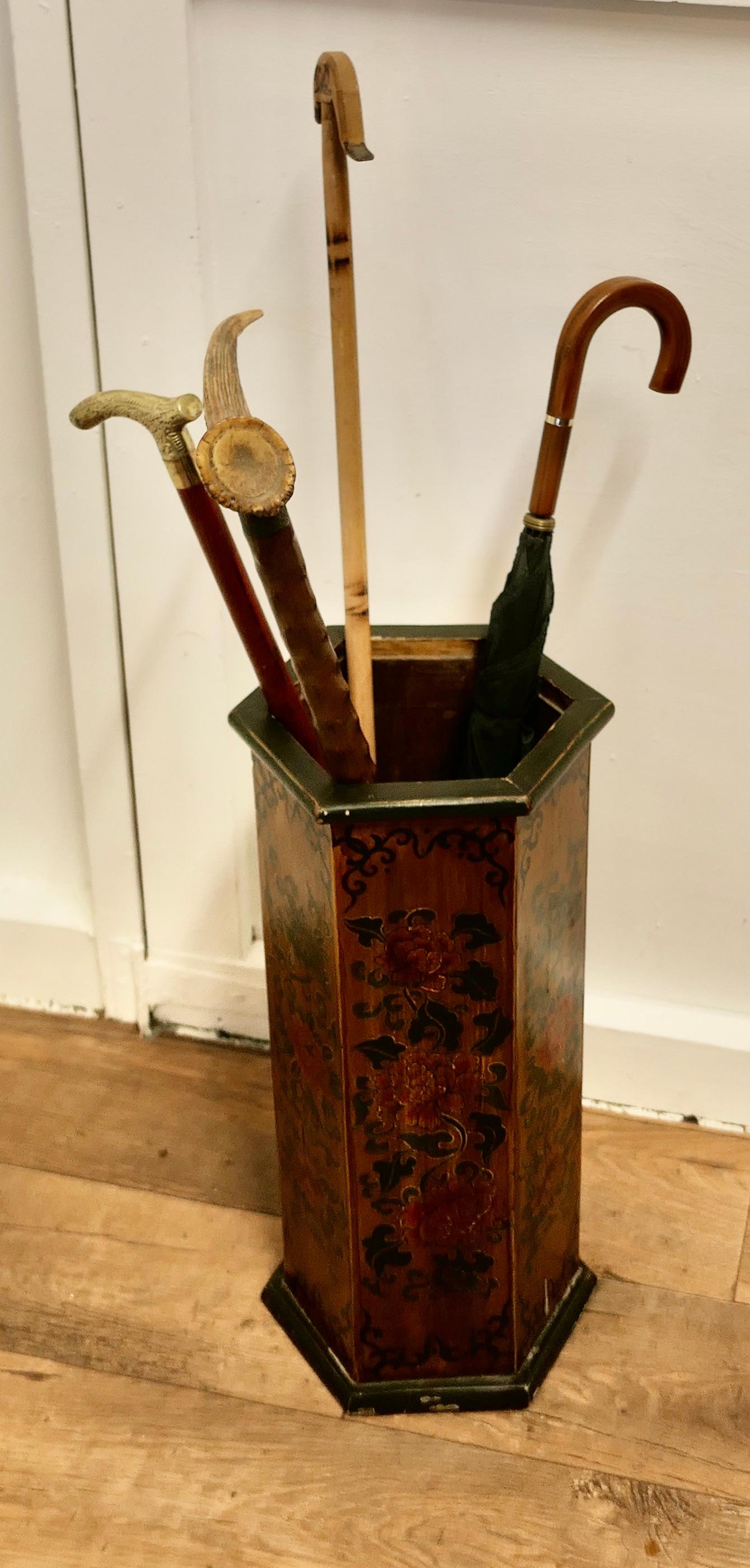 Octagonal Chinoiserie Umbrella Stand

A very attractive piece made in wood and decorated with chrysanthemums for luck
The Stand is 24” tall and 10” in diameter
VY73