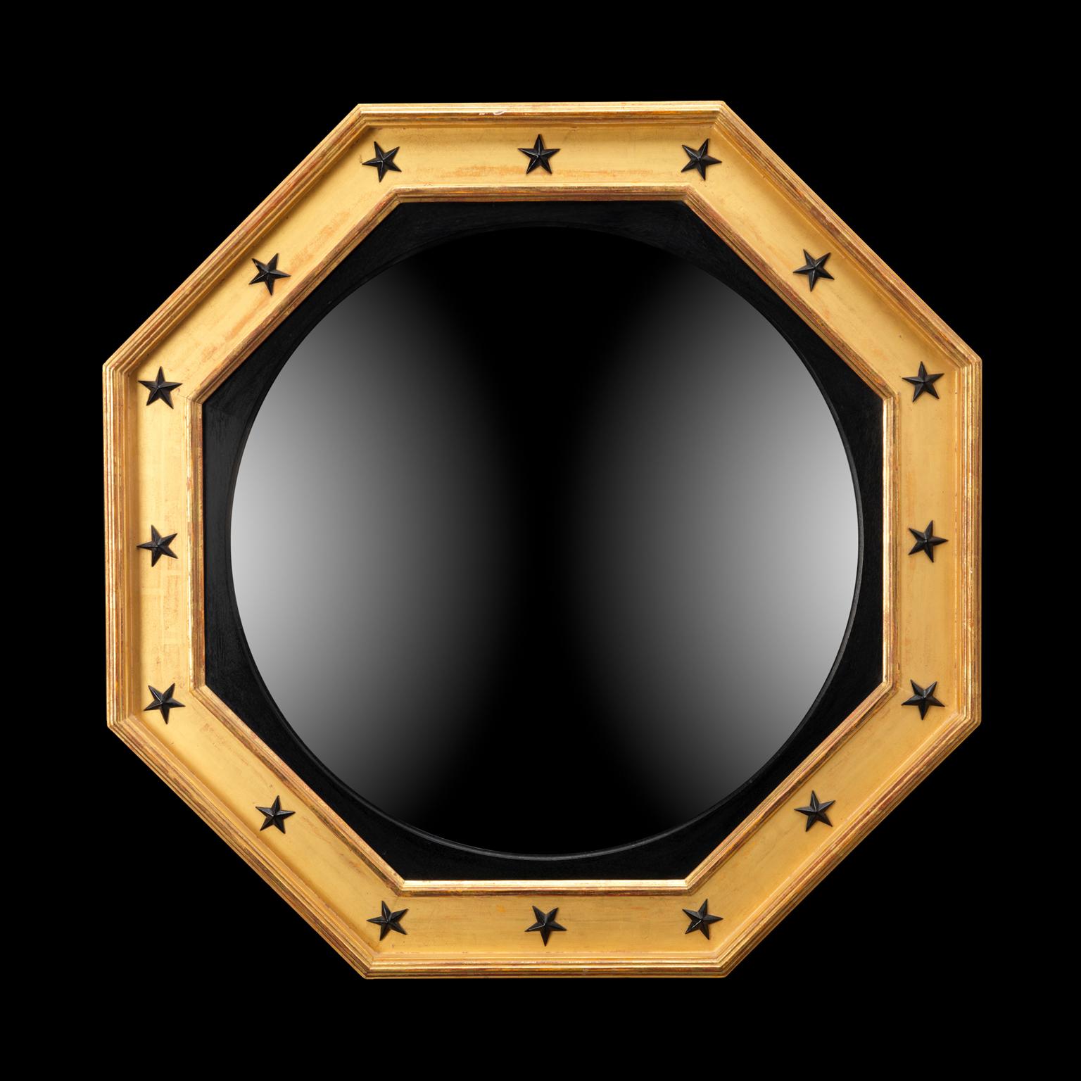A fine gilt and ebony octagonal round glass convex mirror in the manner of Thomas Hope with ebonized star decoration.

We are currently working to a 30-36 week lead time.