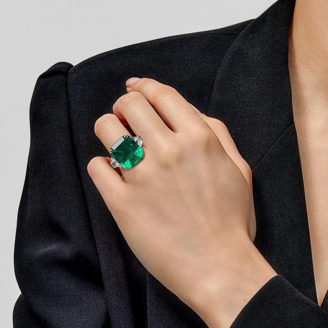 This exquisite emerald ring is a masterpiece to be treasured and passed on to future generations. The stone weighs a whopping 15.60 carats and is certified Colombian, which produces the world’s most sought-after emeralds. The stone has been cut into