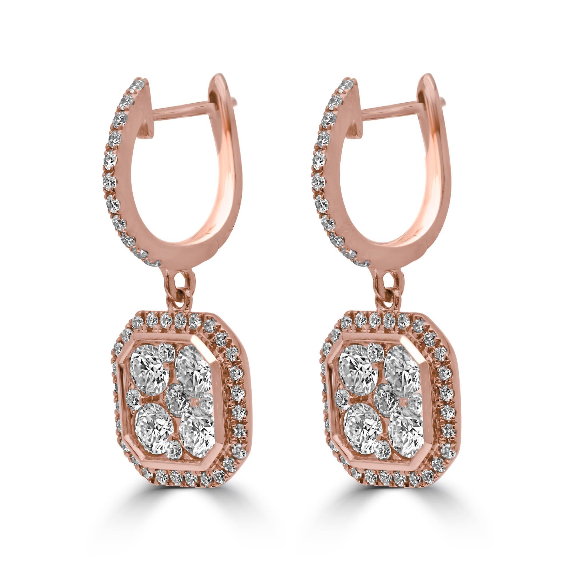 A classic cluster octagonal dangling diamond earrings.
1.50ct round brilliant cut diamonds mounted in 18Kt rose gold.
Matching pendant is available.
Contact us for more information.