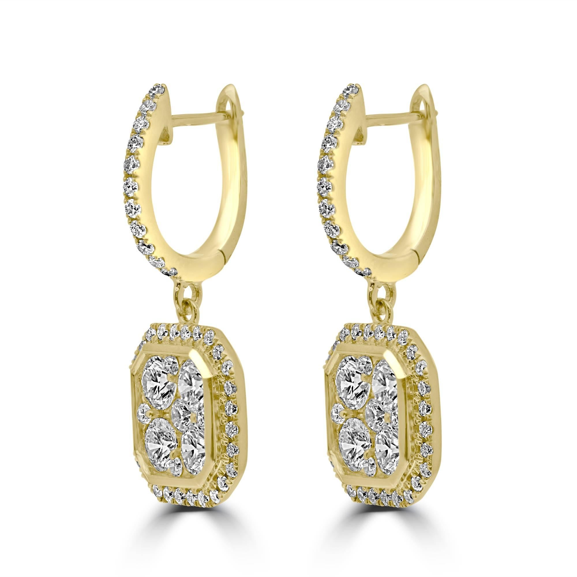 A classic cluster octagonal dangling diamond earrings.
1.50ct round brilliant cut diamonds mounted in 18kt yellow gold.
Matching pendant is available.
Contact us for more information.