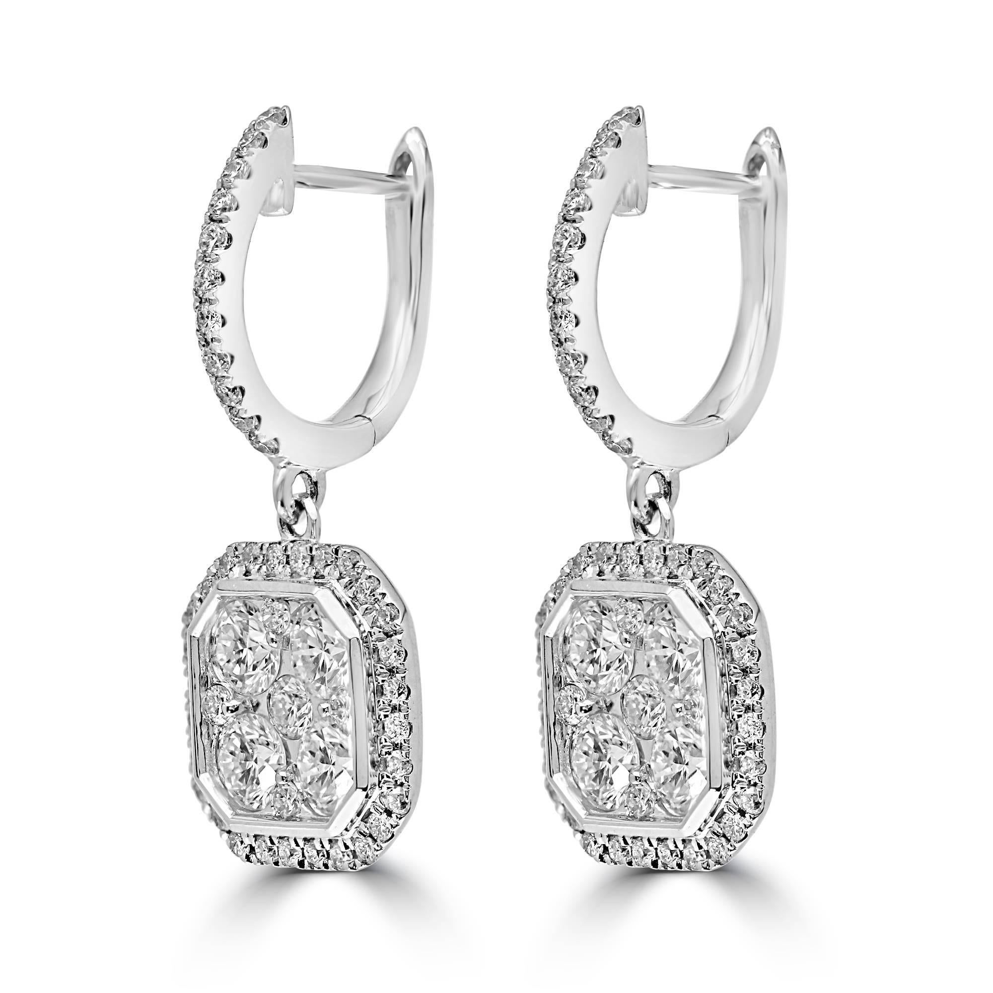 Classic cluster octagonal dangling diamond earrings.
1.50ct round brilliant cut diamonds mounted in 18kt white gold.
Matching pendant is available.
Contact us for more information.