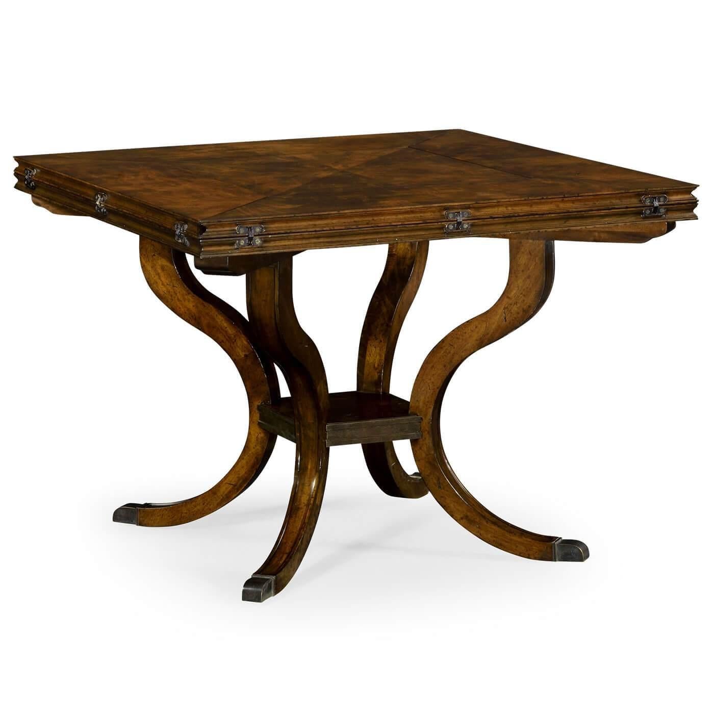 An unusual English mahogany folding extension octagonal dining table on an out swept four leg base.

Open dimensions: 61.25