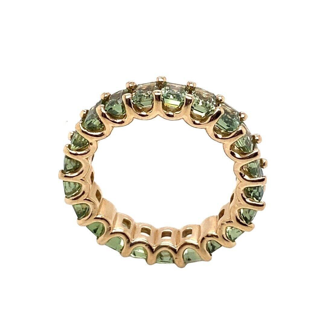 Octagonal Green Natural Sapphire Full Eternity Ring
The Octagonal Green Natural Sapphire Full Eternity Ring is a beautiful piece of craftsmanship. This stunning ring features 21 octagonal cut natural green Sapphires. This ring is set in 14ct yellow