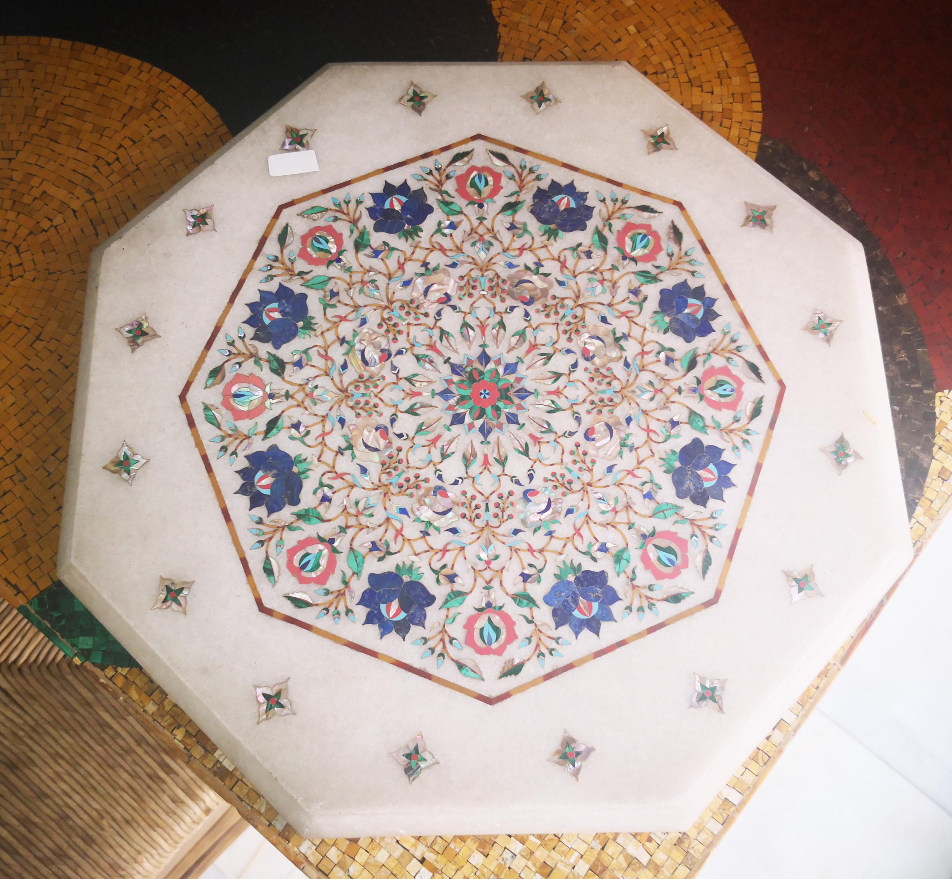 Octagonal hand-carved marble table with Italian Pietre Dure inlay mosaic, using semiprecious stones including malachite, lapis lazuli and turquoise.

