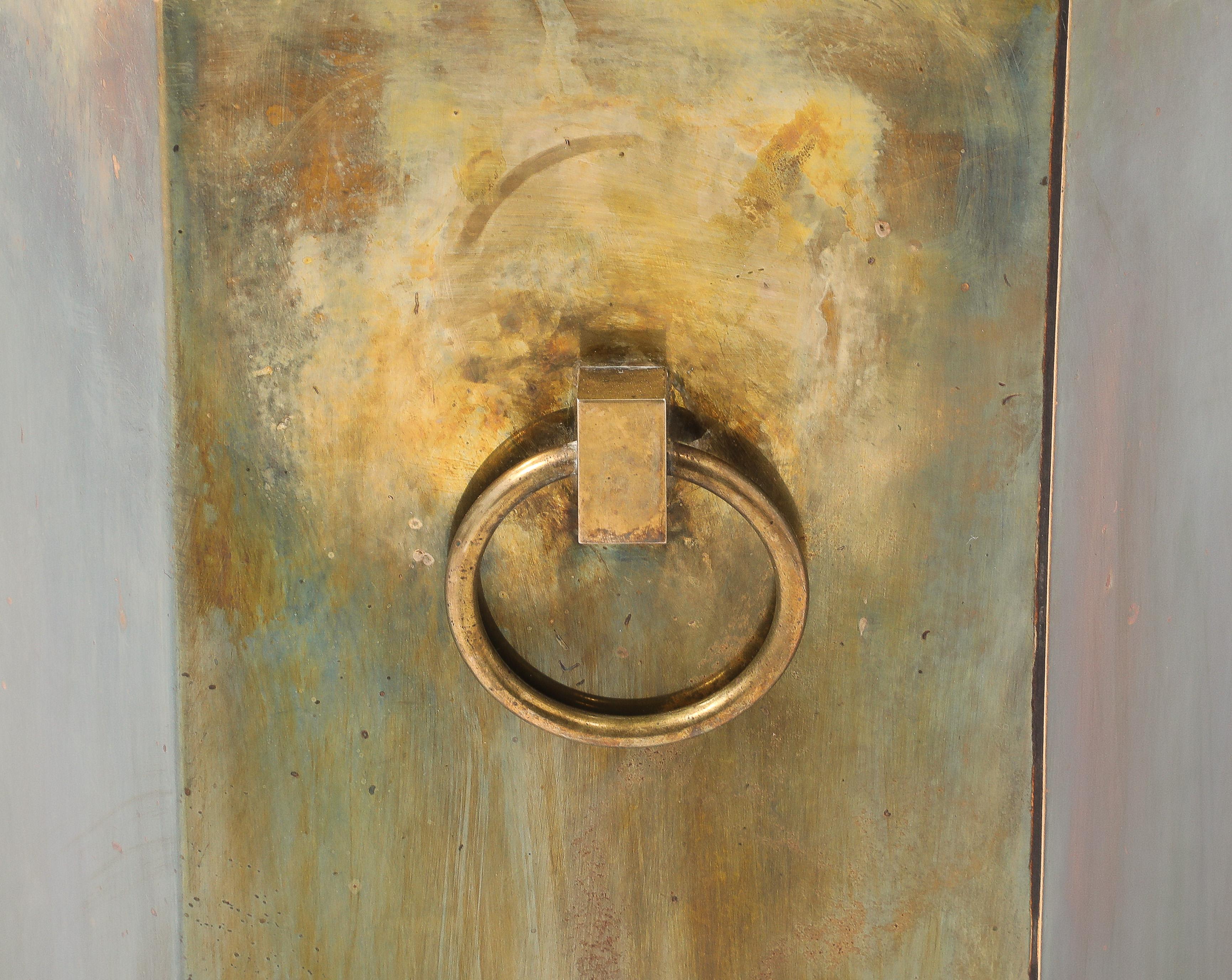 Brass umbrella stand with handles on each side with a wonderful patina.