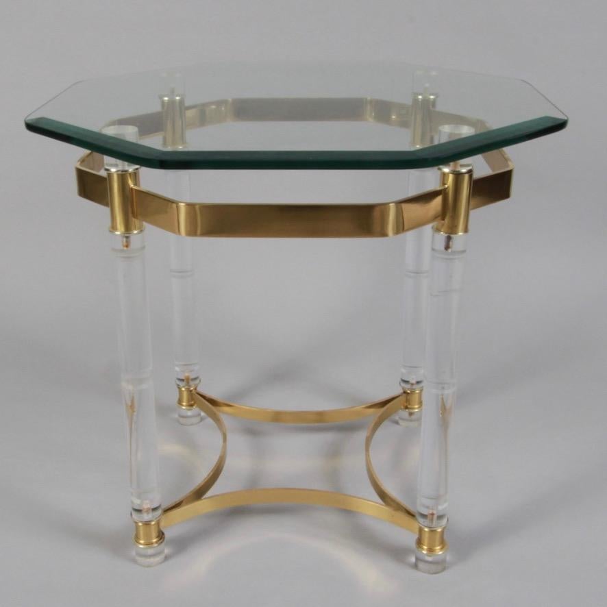70s vintage side table in the manner of Charles Hollis Jones. Beveled glass is in clean shape as is the brass and the acrylic/lucite legs.