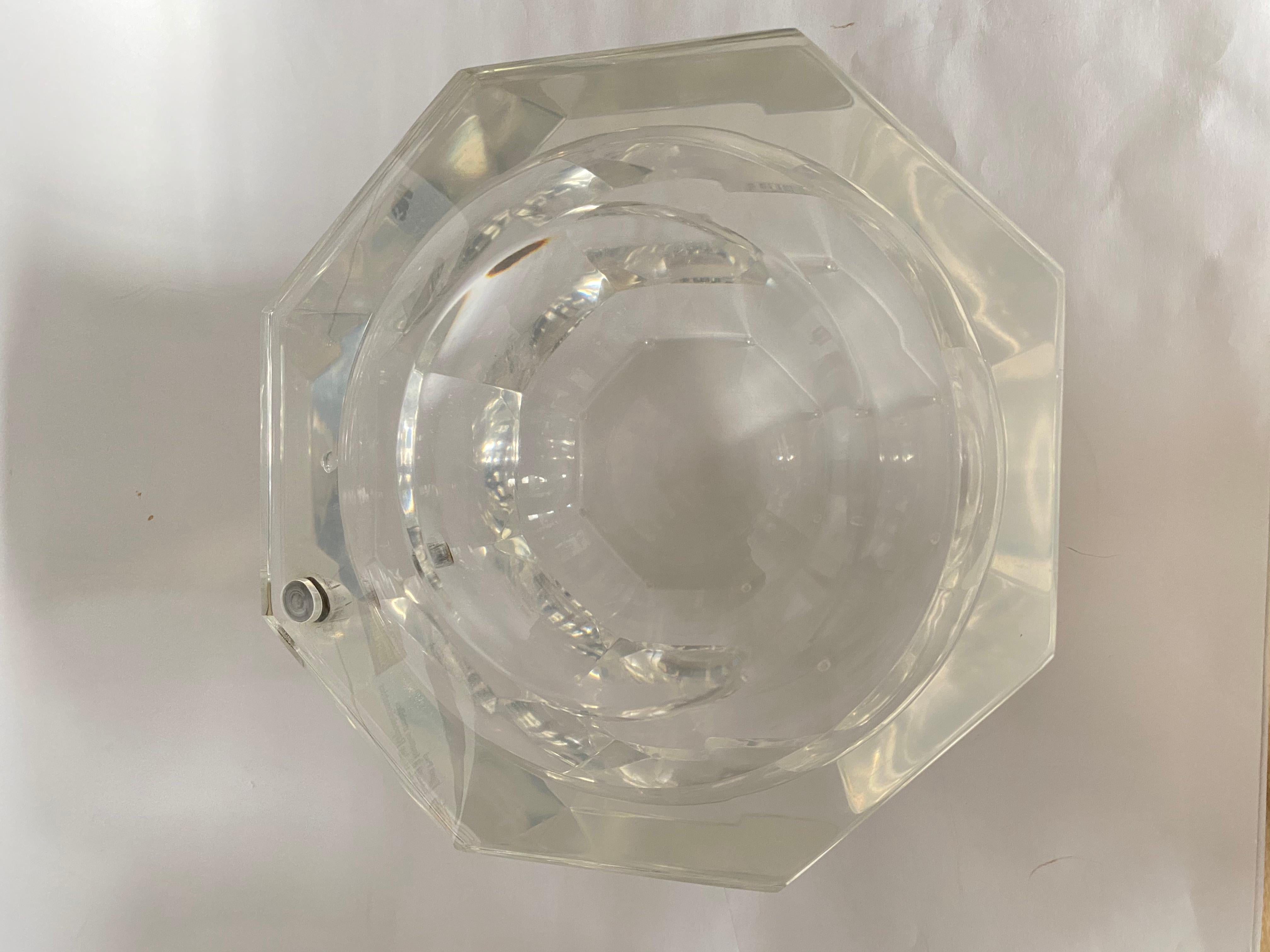 Octagonal Lucite ice bucket, a Carole Stupell design, circa 1970 with swivel top.