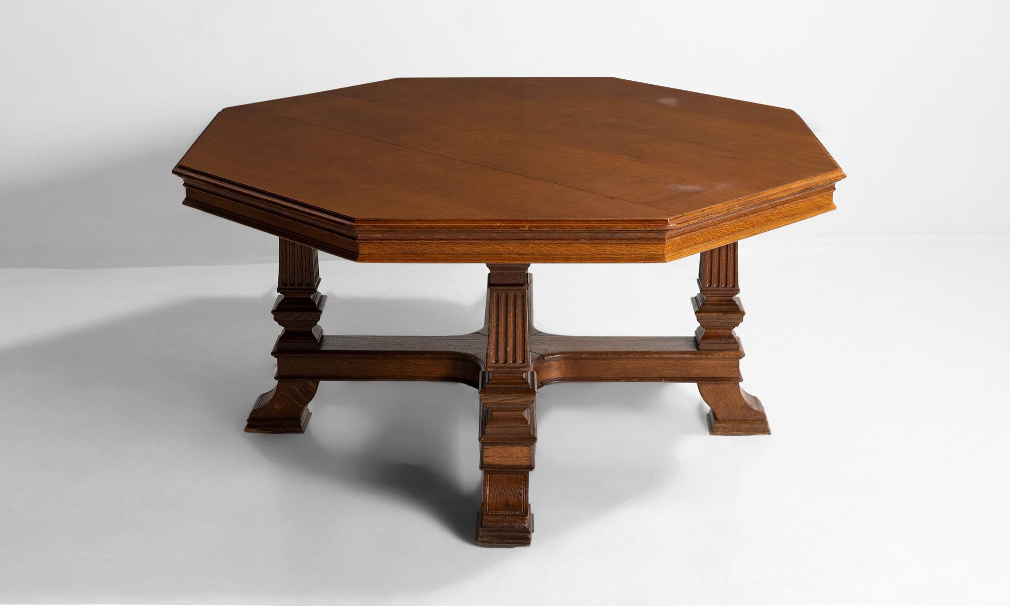 Octagonal oak table, England circa 1890.

Finely carved English refectory table constructed in quarter sawn oak.

Measures: 57” W x 57” D x 29.5” H x 25.5” apron.