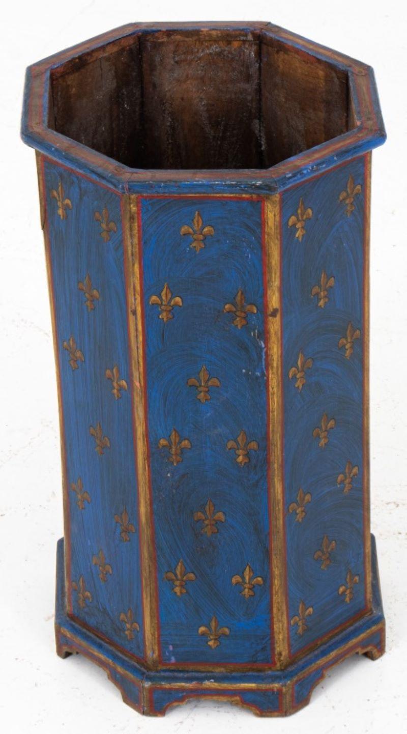 Octagonal painted umbrella or cane stand, overall decorated in blue with gilded fleurs-de-lys. 20