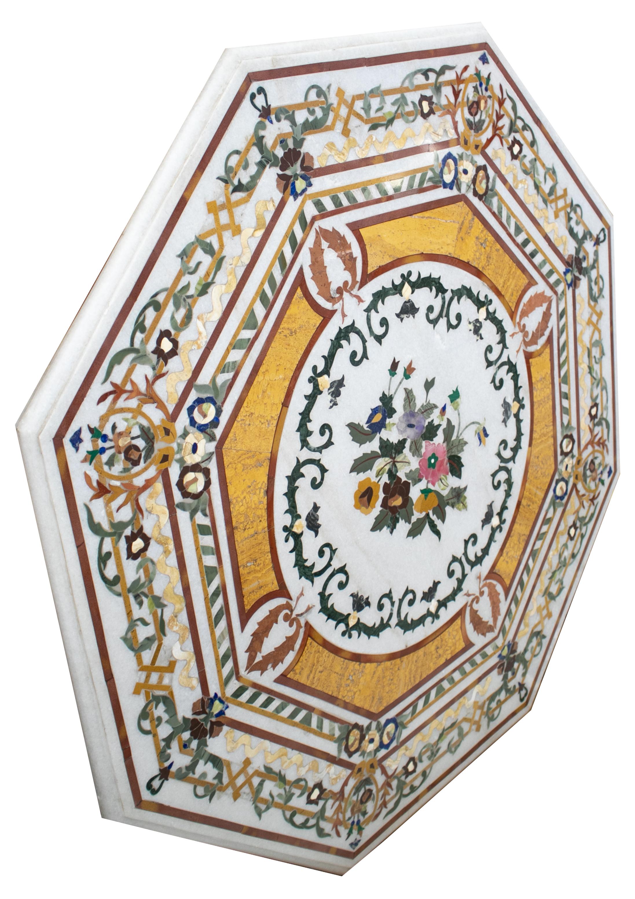 Octagonal Italian pietre dure technique handmade mosaic white marble tabletop with blue lapis, green jade and other semiprecious stones inlay.


  