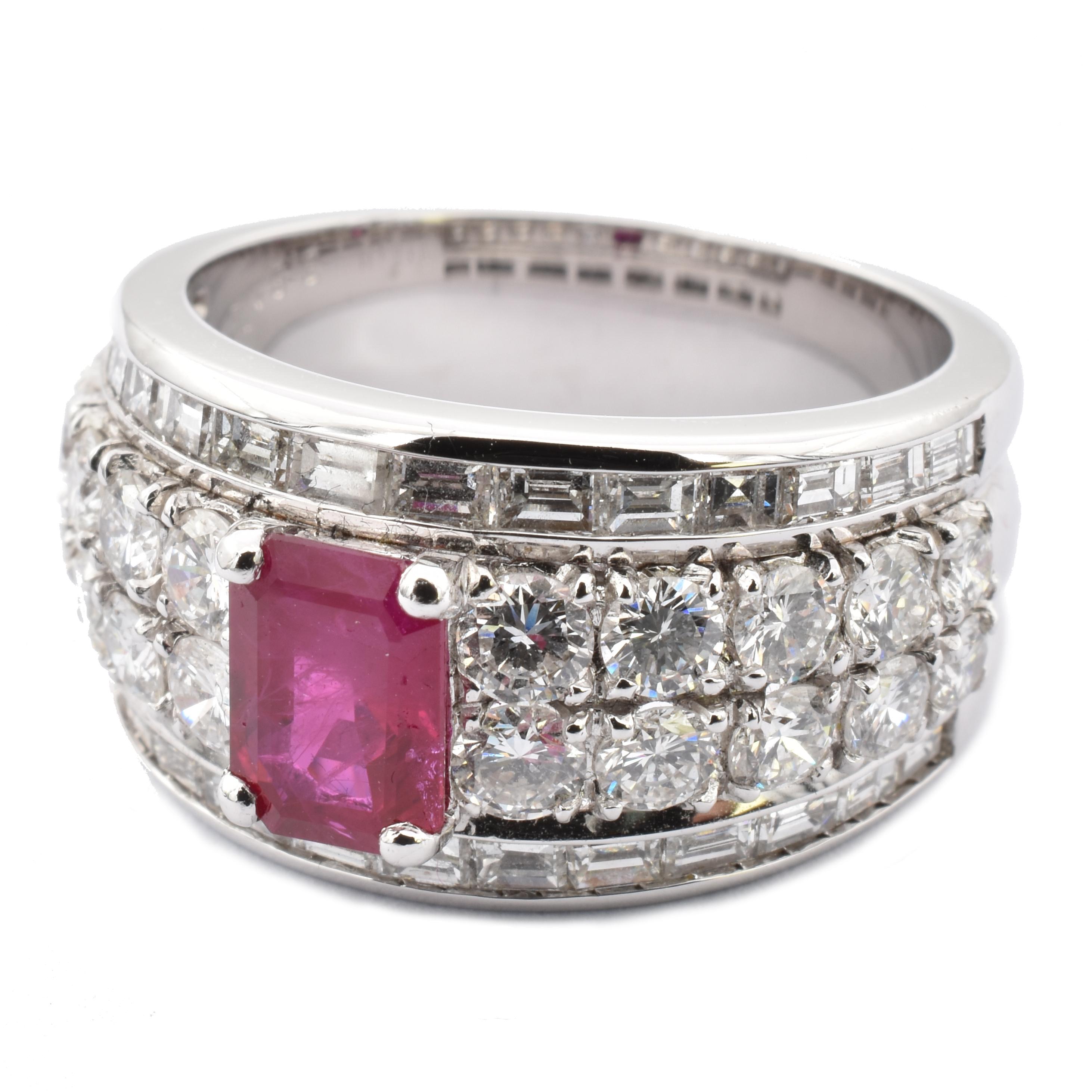 Gilberto Cassola 18Kt White Gold Ring with an Emerald Cut Intense Red Natural Ruby. 
This Ring has 10 Brillant Cut Round Diamonds on each side of the Ruby and 2 rows of Baguette Cut Diamonds.
Natural Ruby ct 0.98 mm 7.00 X 4.90
Round Diamonds are G