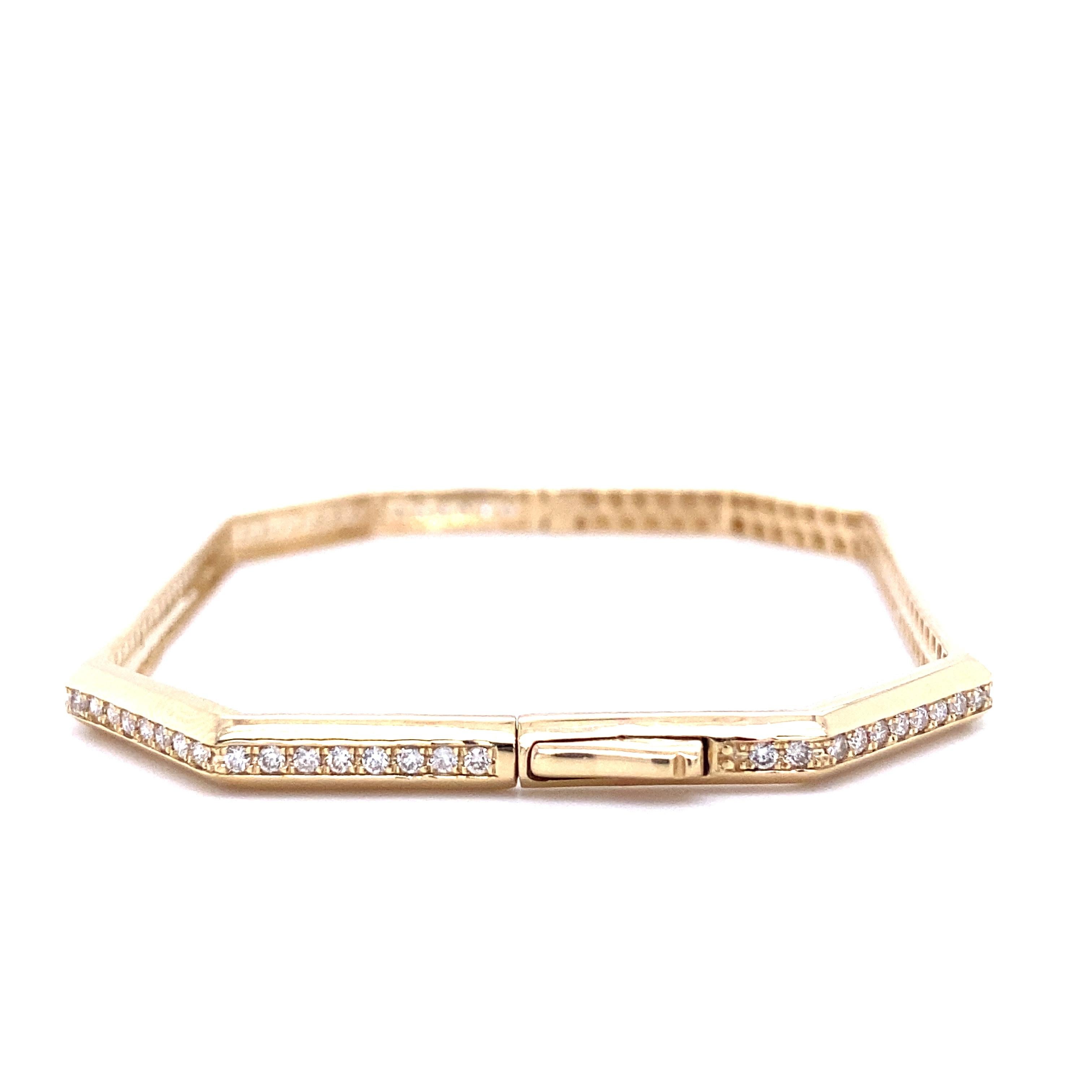

Introducing our Octagonal Shape Bangle Bracelet, a captivating blend of classic design and modern elegance. This exquisite piece is meticulously crafted in radiant 18K solid gold, creating a luxurious foundation for a stunning arrangement of round