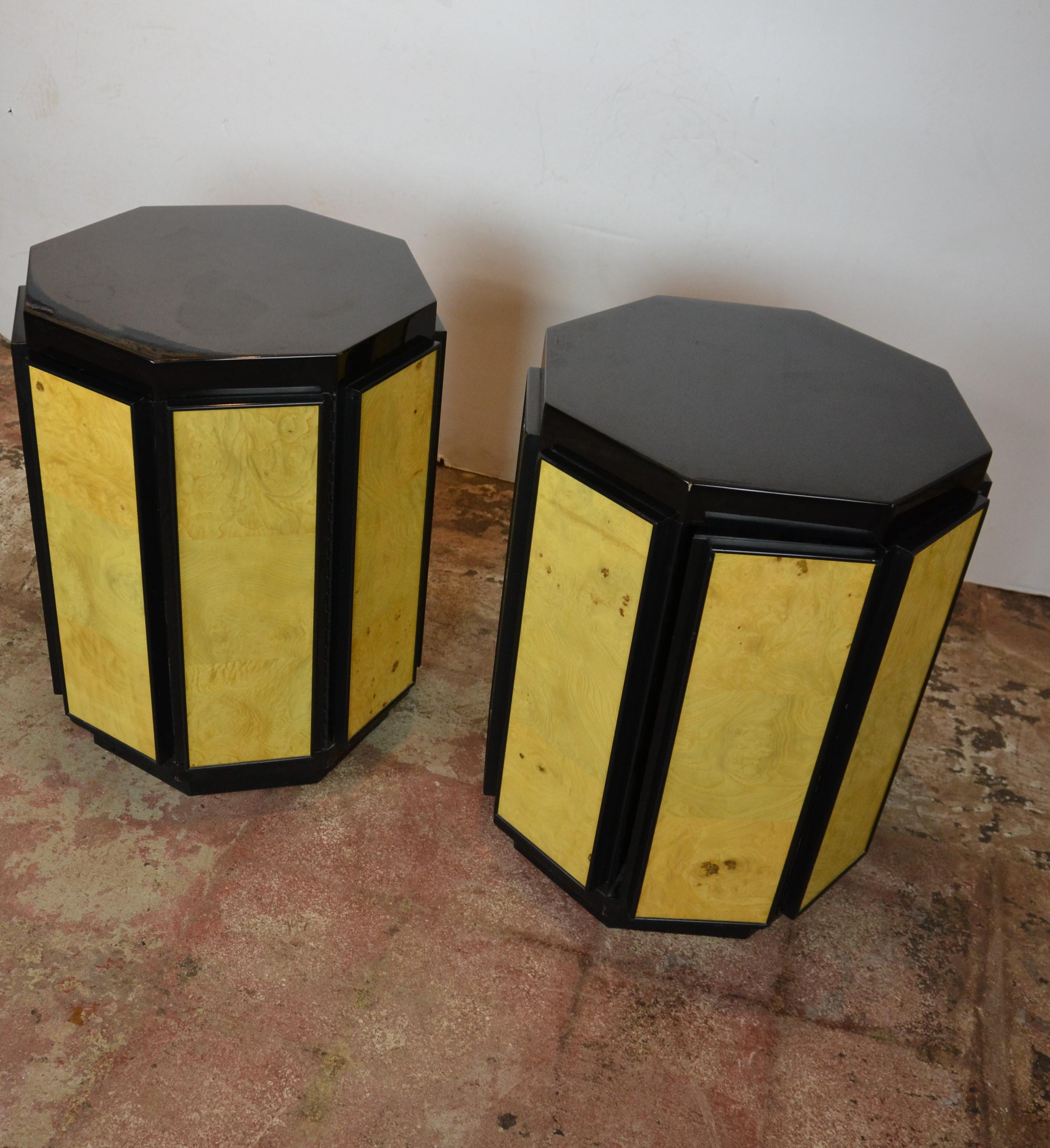 Octagonal shape end tables by Henredon features a burl wood exterior with contrasting ebonized black lacquer base and top. Push open cabinet has a single adjustable interior shelf.