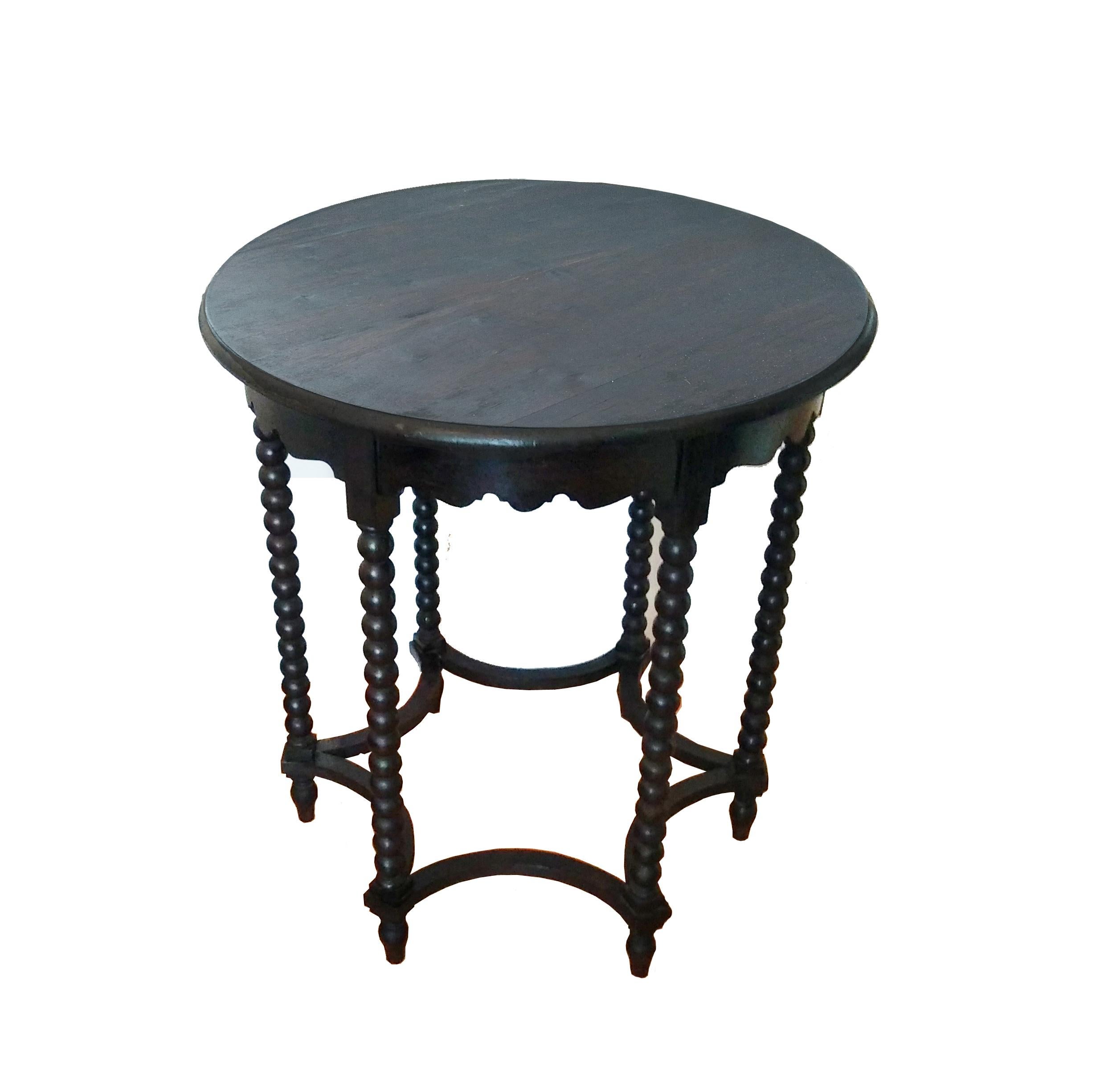 Round antique table of the 19th century. Wood with bobin legs

This table is raised on a base composed of six bobin legs and a optogonal star stretcher, also turned




   
