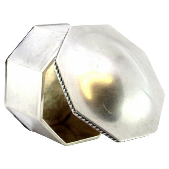 Octagonal silver box with pearls on the hinged lid