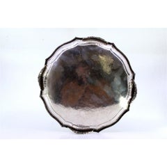 Octagonal silver tray w/ plant engravings & 3 cut-out feet