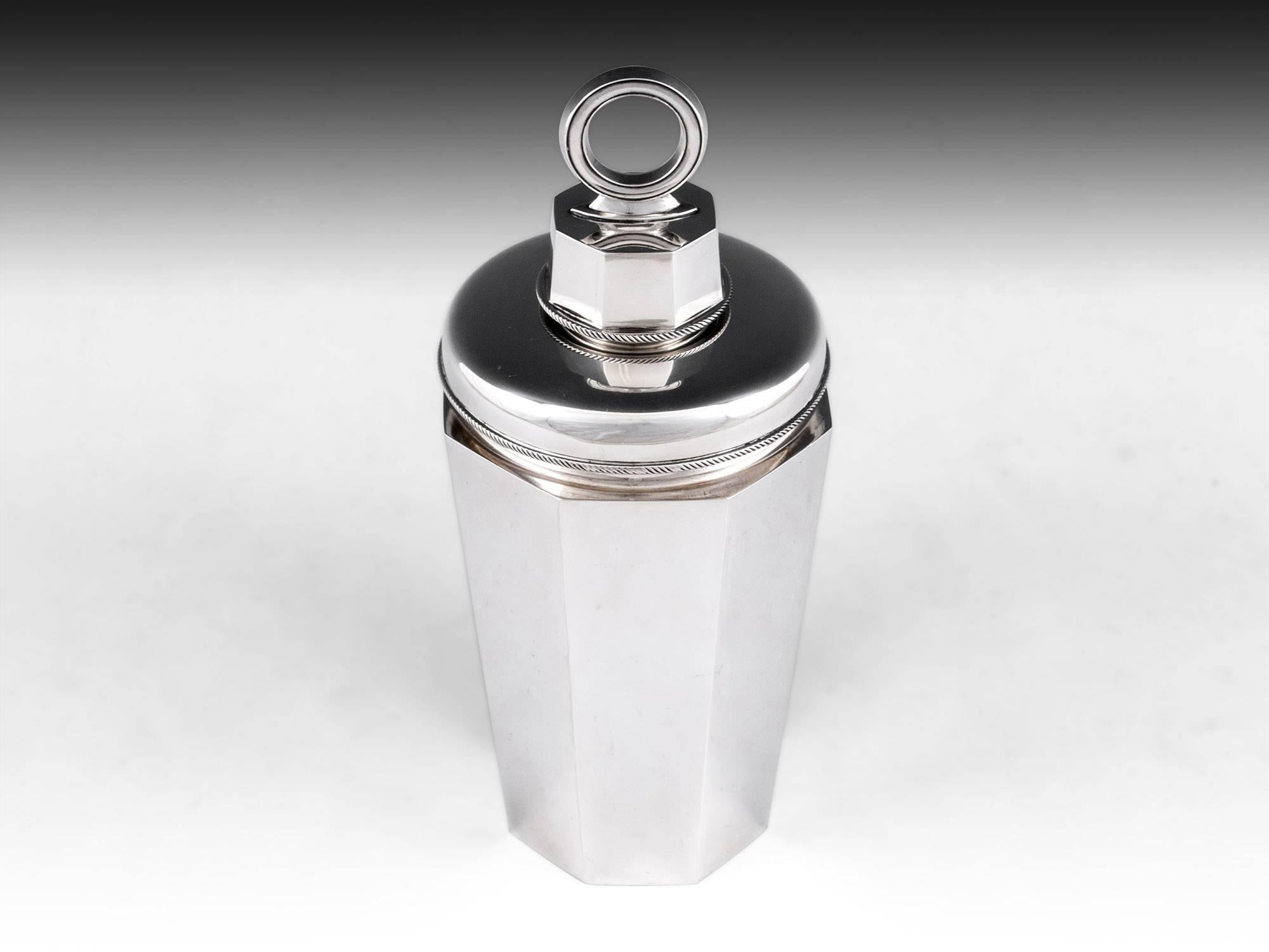 Norwegian solid silver octagonal tapered cocktail shaker with removable ring cap and separate strainer. Base hallmarked Sterling (925 silver standard), Norway, Oslo, Maker Jacob Tostrup (one of the most revered and collectible Norwegian silversmiths