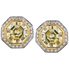 Octagonal Step Cut Diamond 9.62 Carat Fancy Yellow Halo Set GIA Certified Studs