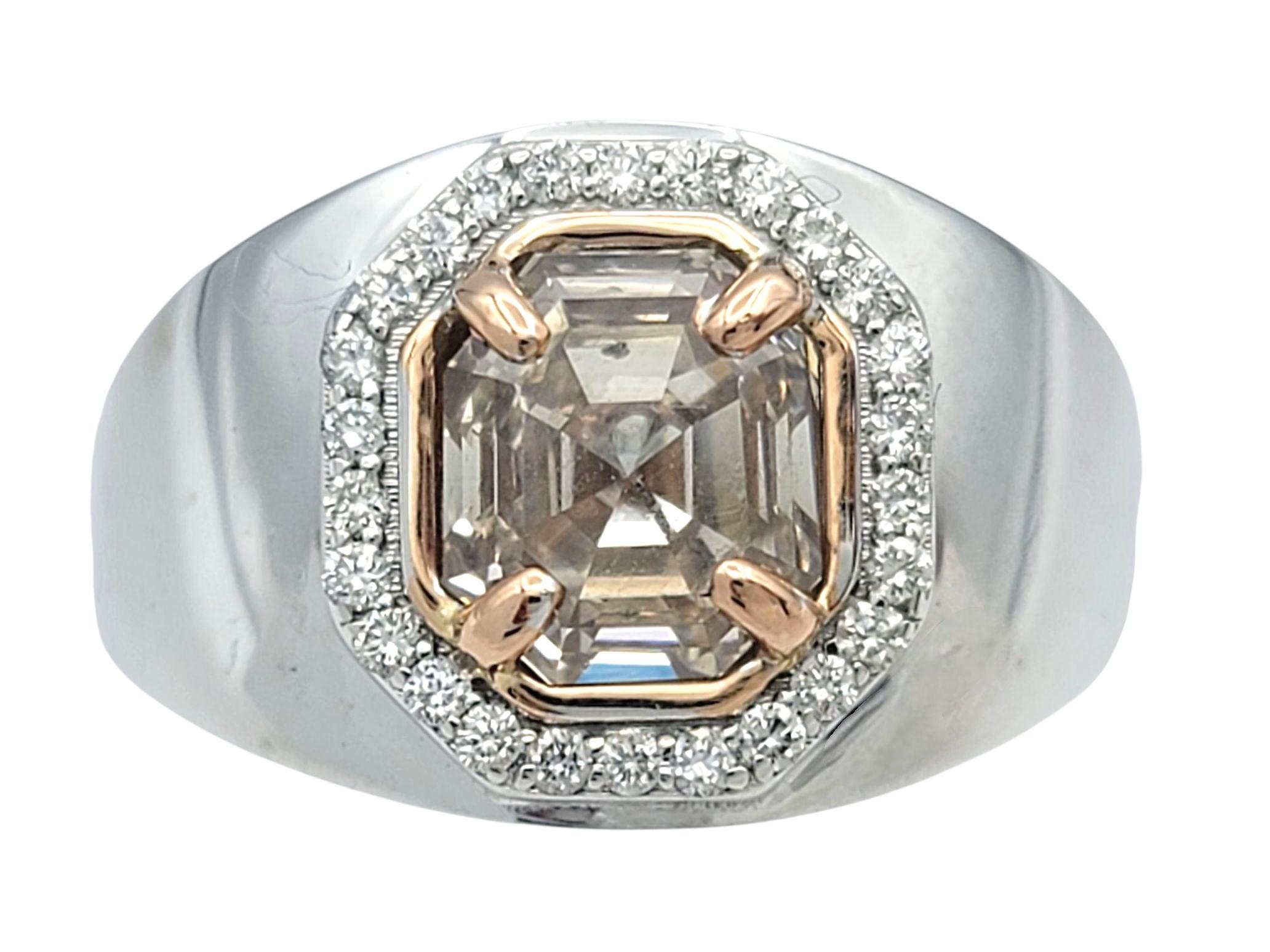 Dieser außergewöhnliche, nach Maß gefertigte Ring verbindet raffinierte Handwerkskunst mit fesselnden Kontrasten. In der Mitte befindet sich ein ausgefallener rosabrauner Diamant im eleganten achteckigen Stufenschliff, der Wärme und Tiefe