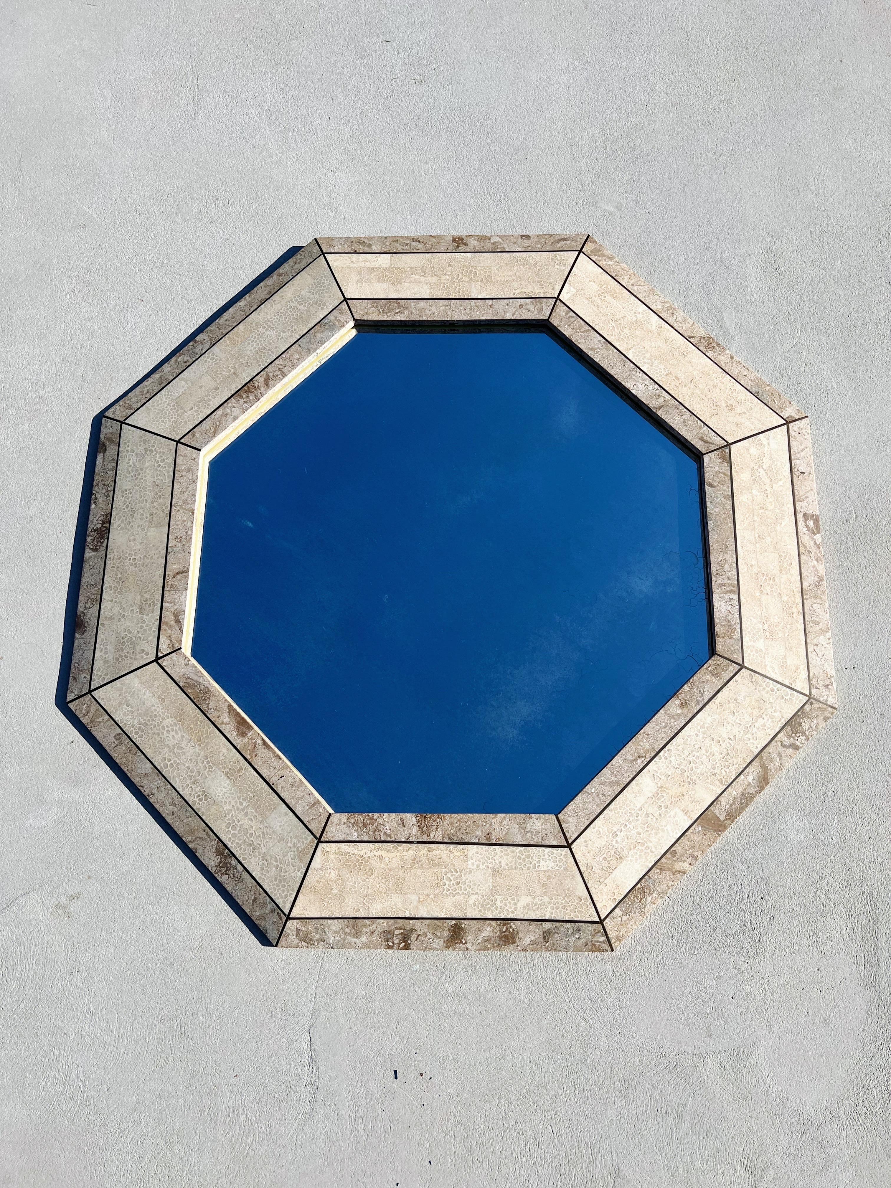Octagonal Tessellated Mactan Stone Fossil Mirror, Attributed to Maitland Smith

Mactan stone is a fossilized stone quarried off the islands of the Philippines. It is quarried, cut, polished and hand-tiled into a framework- such as this mirror.