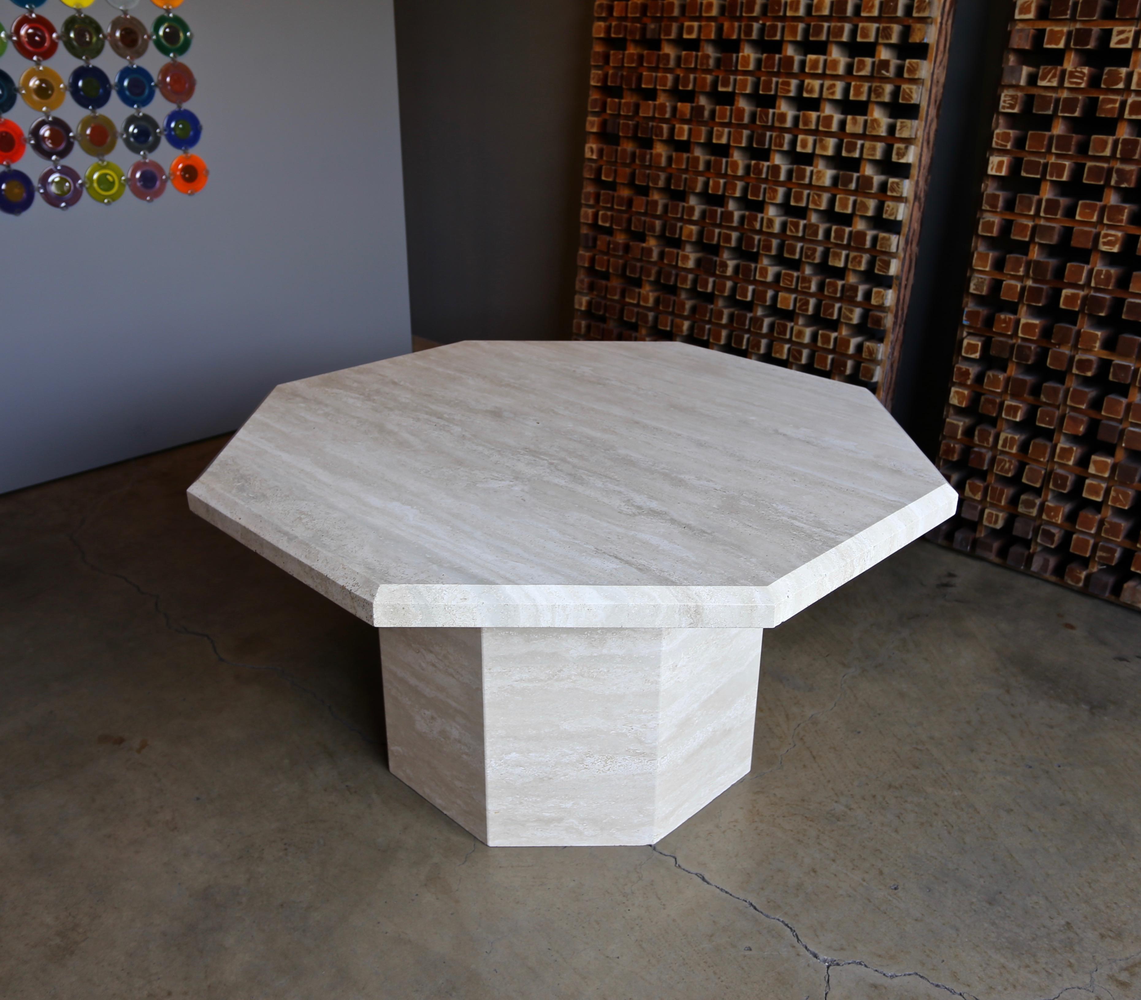 Octagonal travertine centre table, circa 1980.